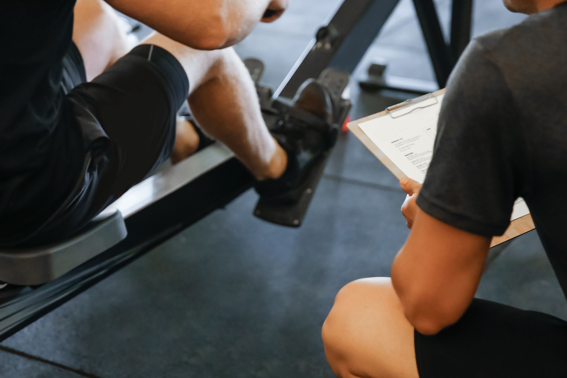 Personal trainer keeping result of calories burn